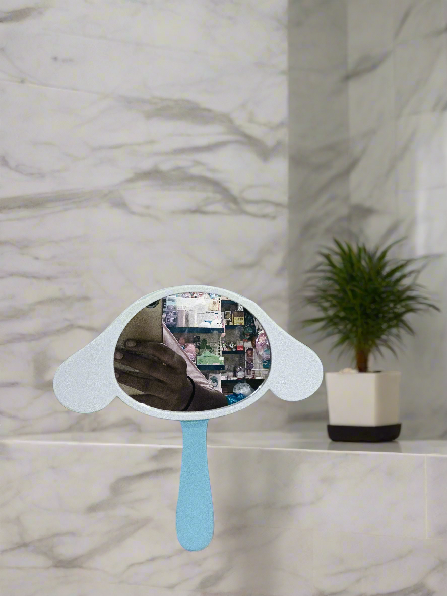 Mirror With Comb