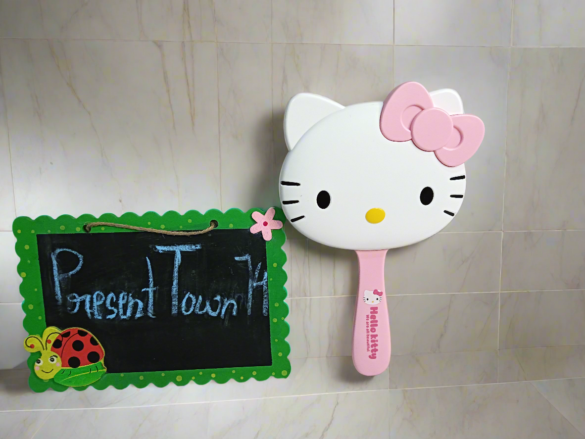 Mirror With Comb